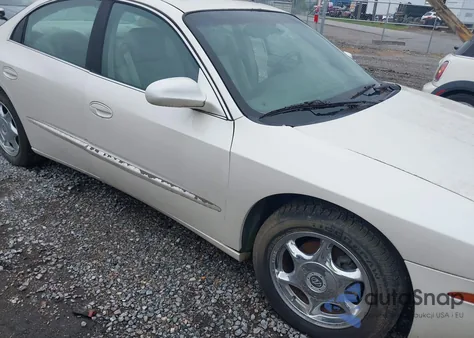 2002 Oldsmobile Aurora 4.0 из США, поврежденный, VIN 1G3GS64C024132008